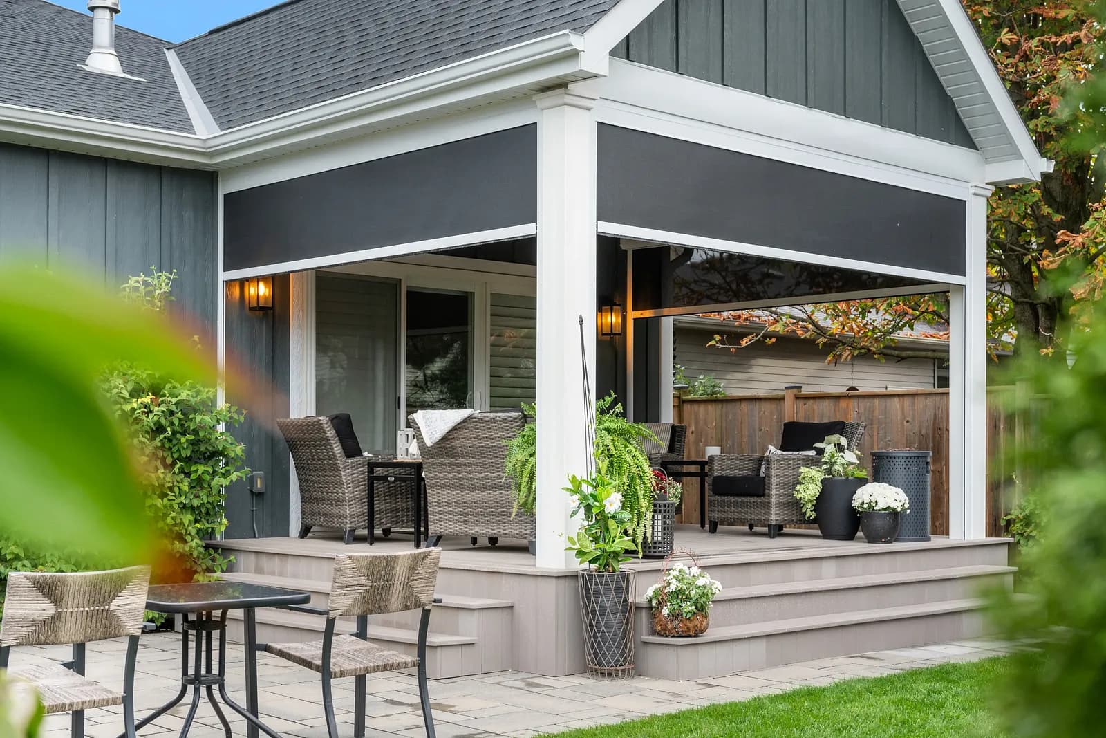 Cottage porch with deployed dark insect mesh